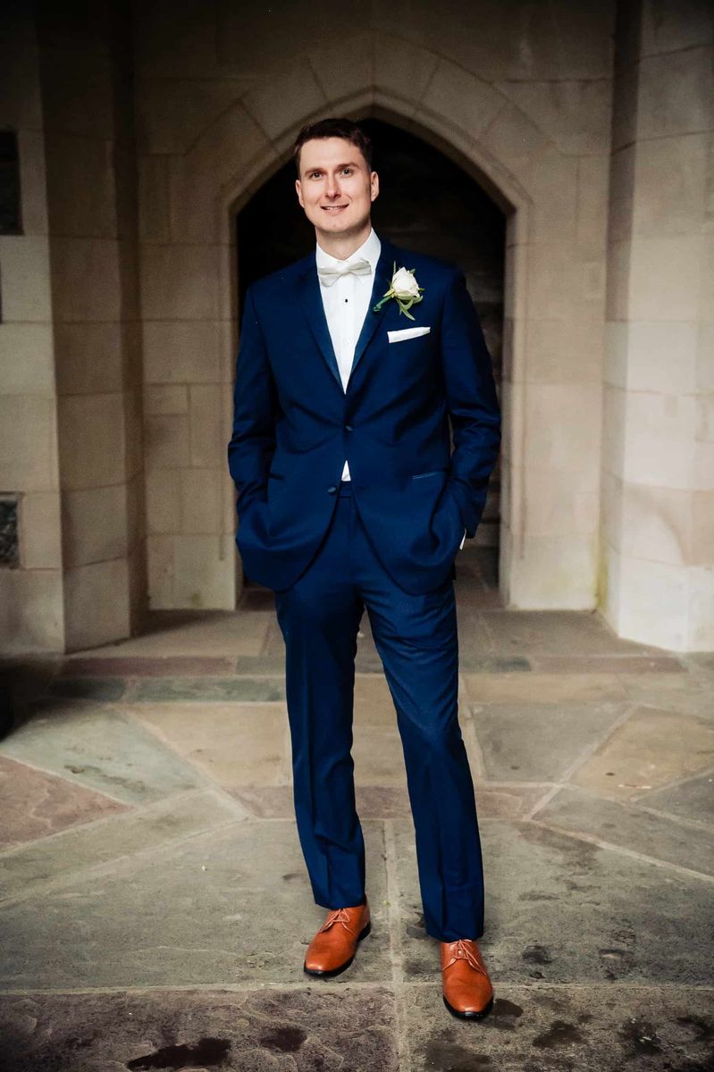 Groom in his navy suit