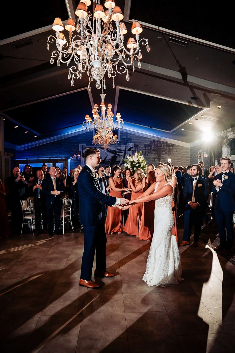 First dance beneath the chandeliers