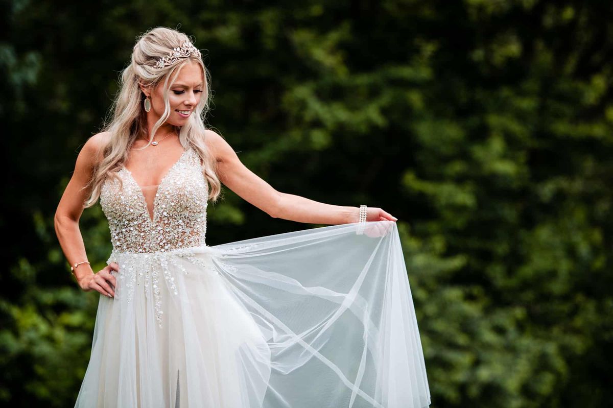 Bride showing off her gown